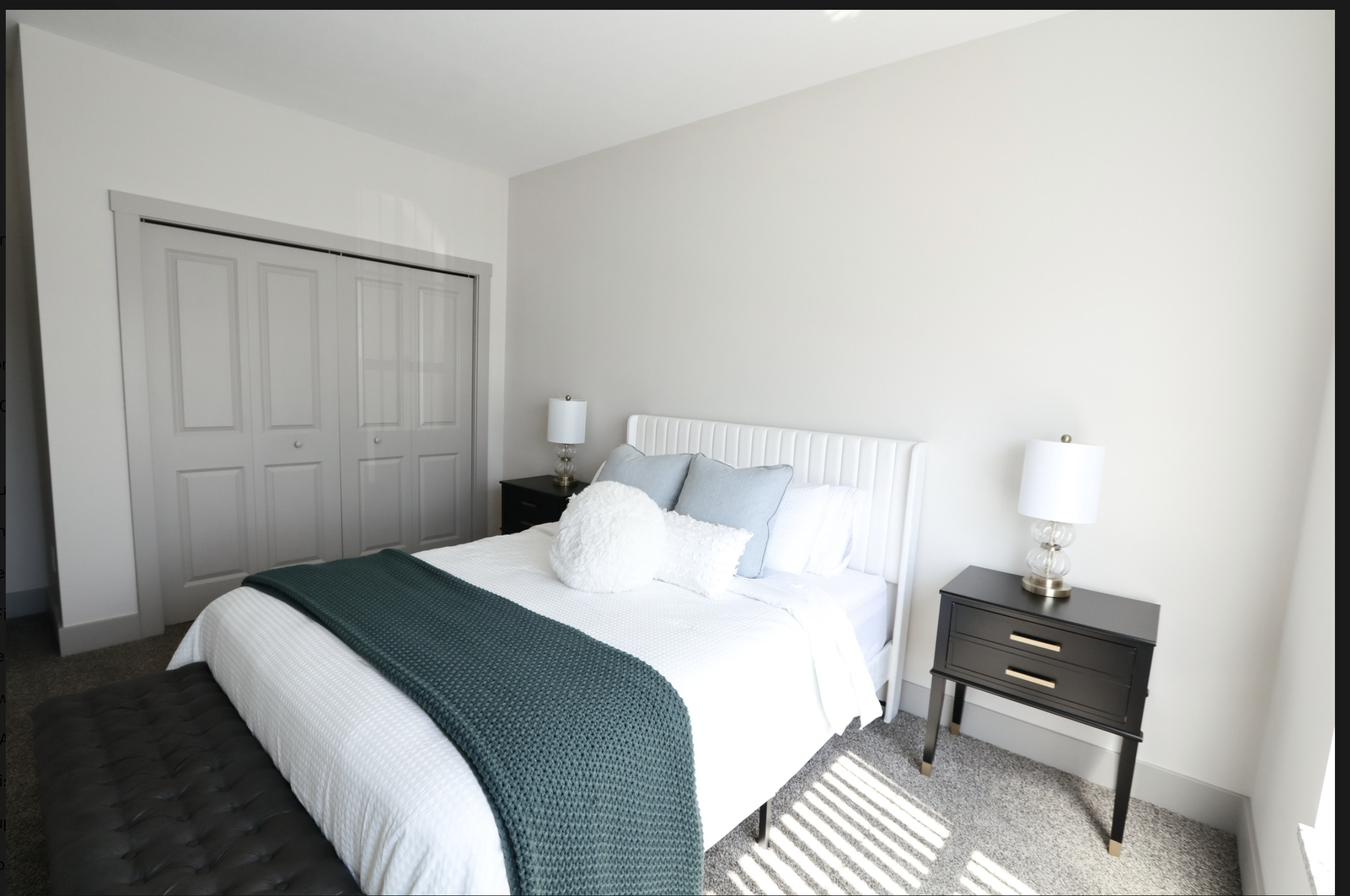 Staged bedroom at Mona Shores Flats